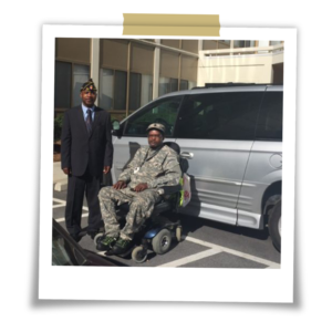 MagicMobility Van veteran recipient in wheelchair next to their new van.