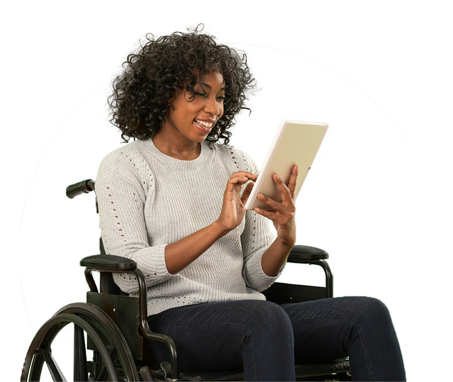 Woman in wheelchair with tablet smiling